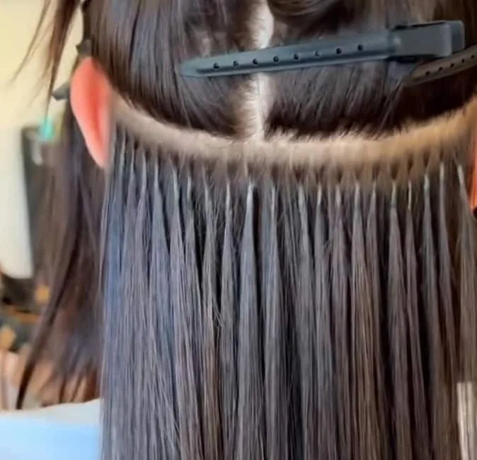 Pose d'extensions à la kératine